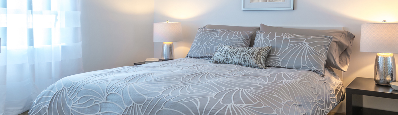 Modern comfortable and elegant luxury master bedroom. Interior design.